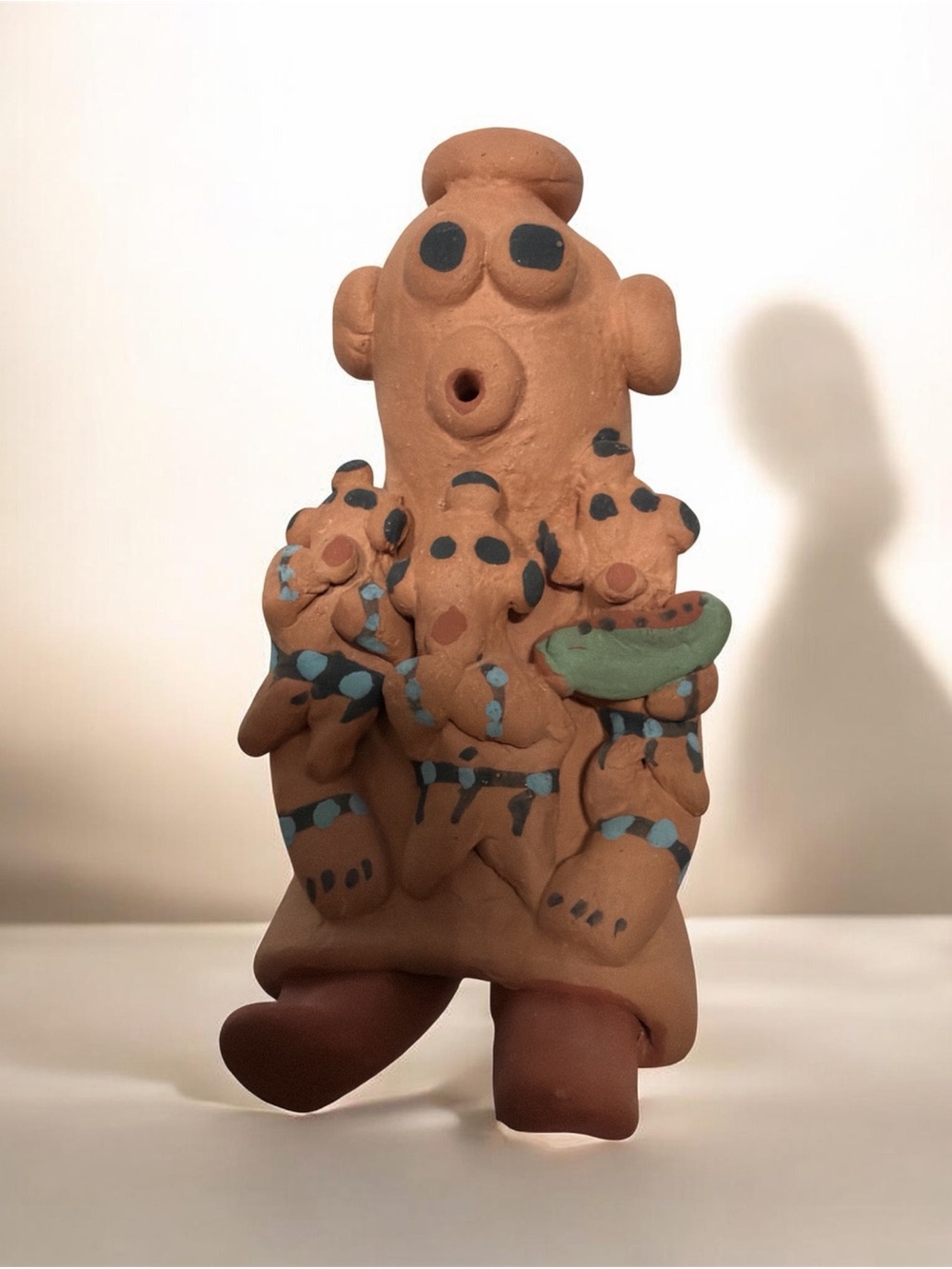 Native American Mudhead‎ storyteller figure